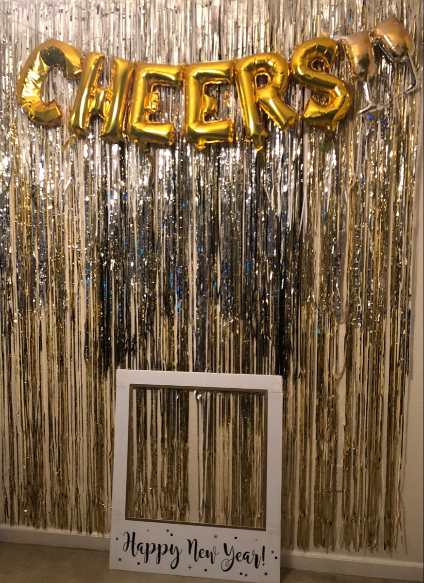CHEERS gold balloon banner with silver fringe